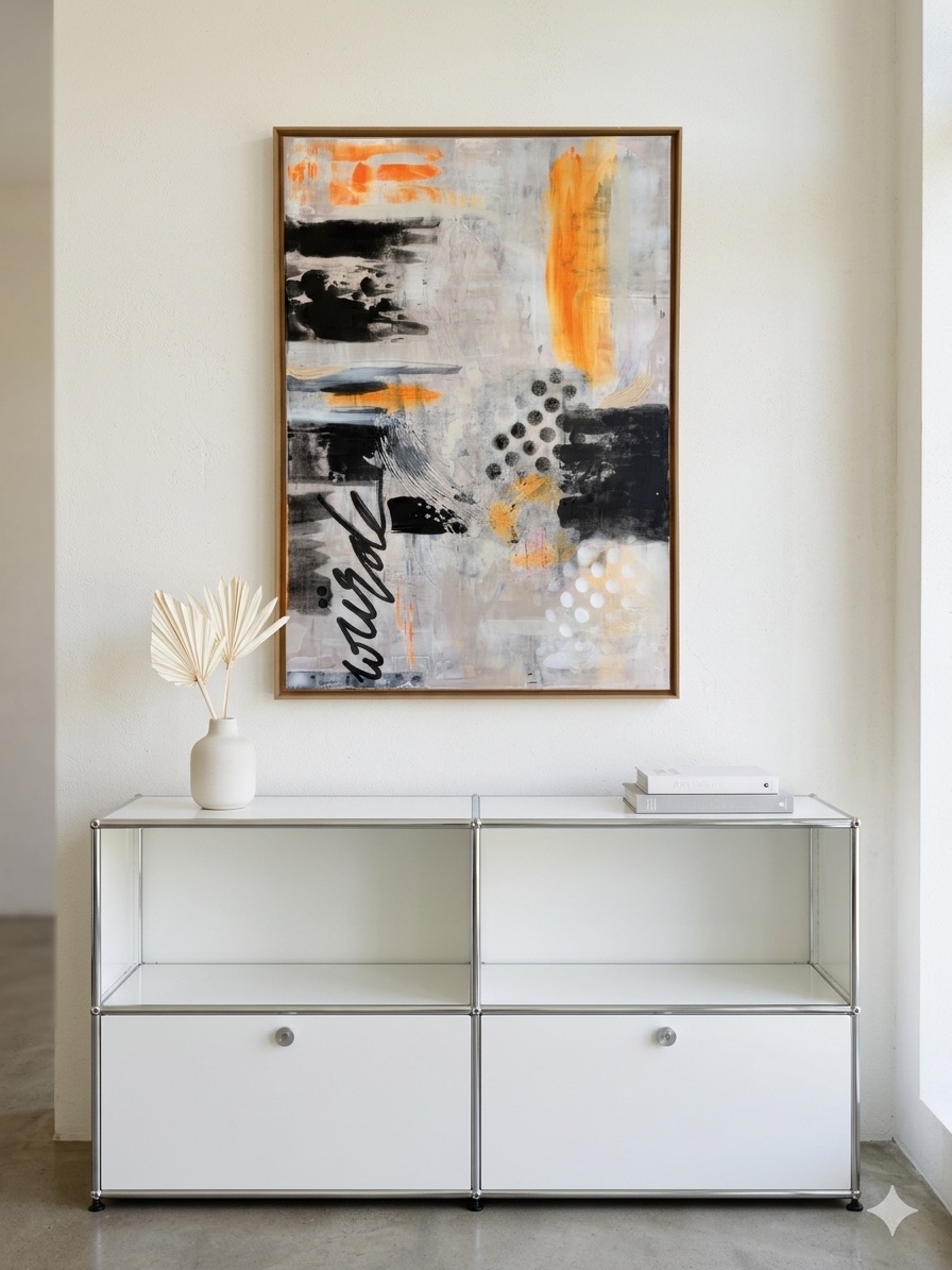 Kunstwerk abstrakt mit weiß, schwarz und neon orangenen Details und Aufschrift "Würde"